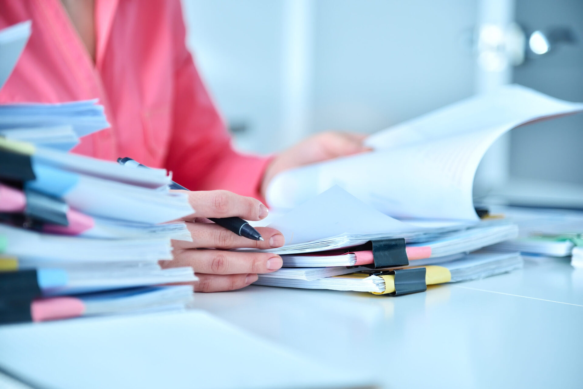 Accountant woman checking report for analysis information.